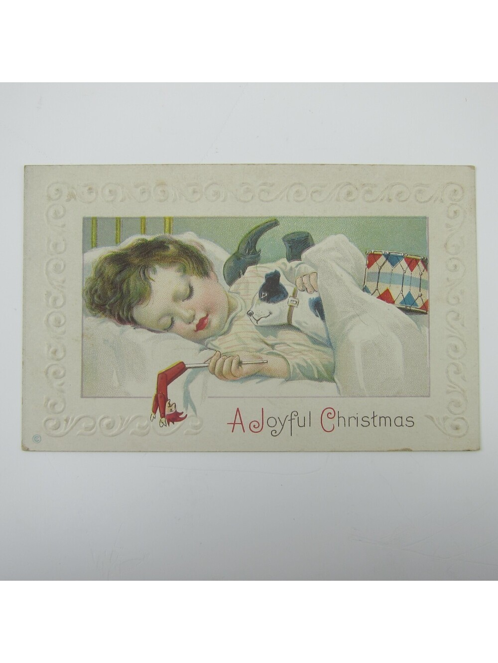 Christmas Postcard Boy Sleeps Toys Fox Terrier Jack Russell Dog Embossed Antique